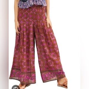 Free People Run River Wide Leg Pants in a purple and pink floral print, size L